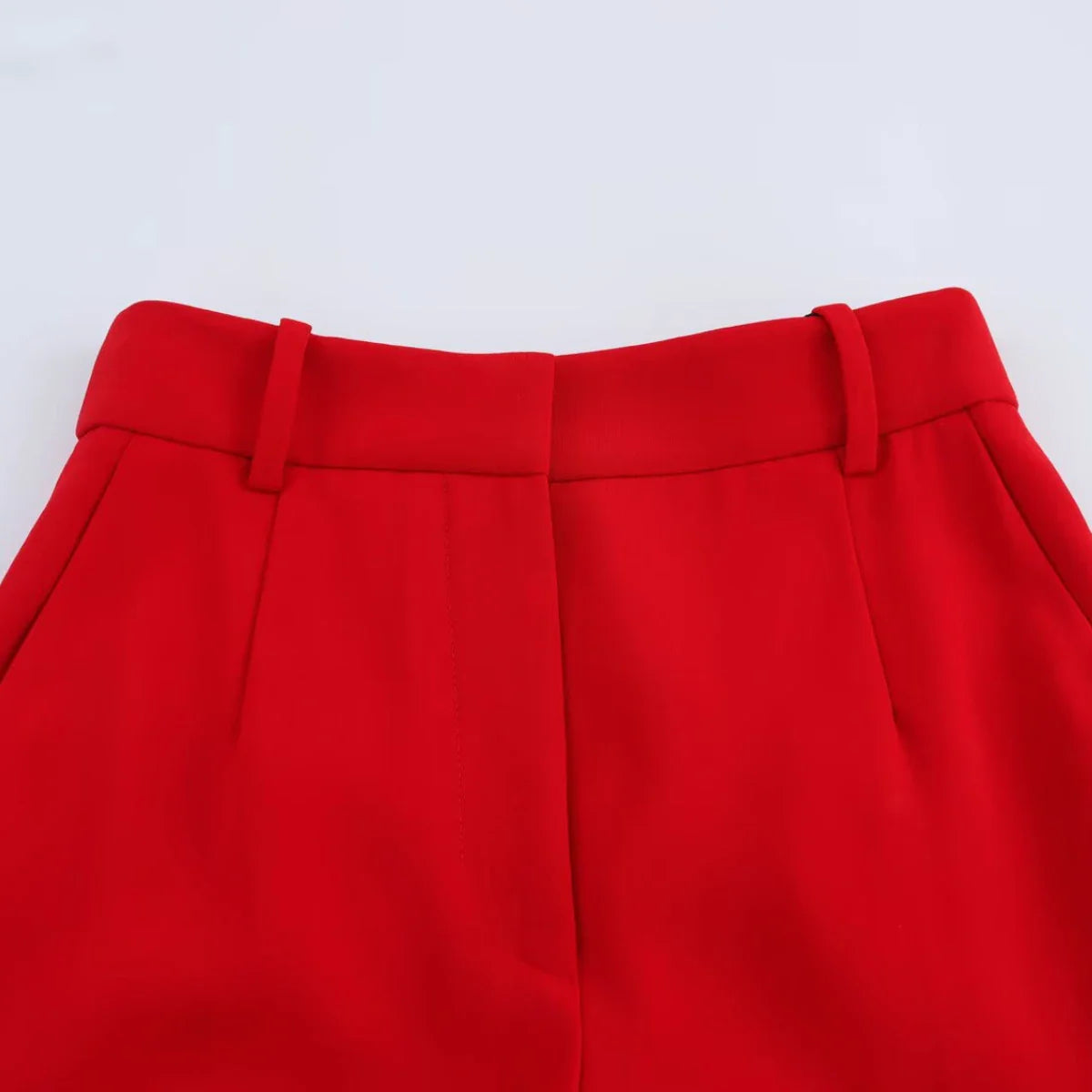 Women's Belted V-neck Vest Top with Shoulder Pads and Pockets Paired with Flared Pants for Casual Spring Summer Chic Look