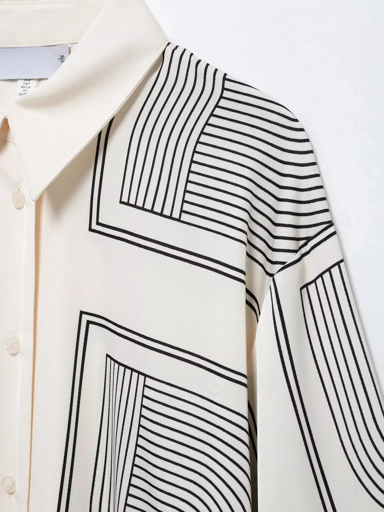 Stylish Women's Suit Set with Long Sleeve Shirt and Wide Leg Pants in Creamy Base and Geometric Patterns