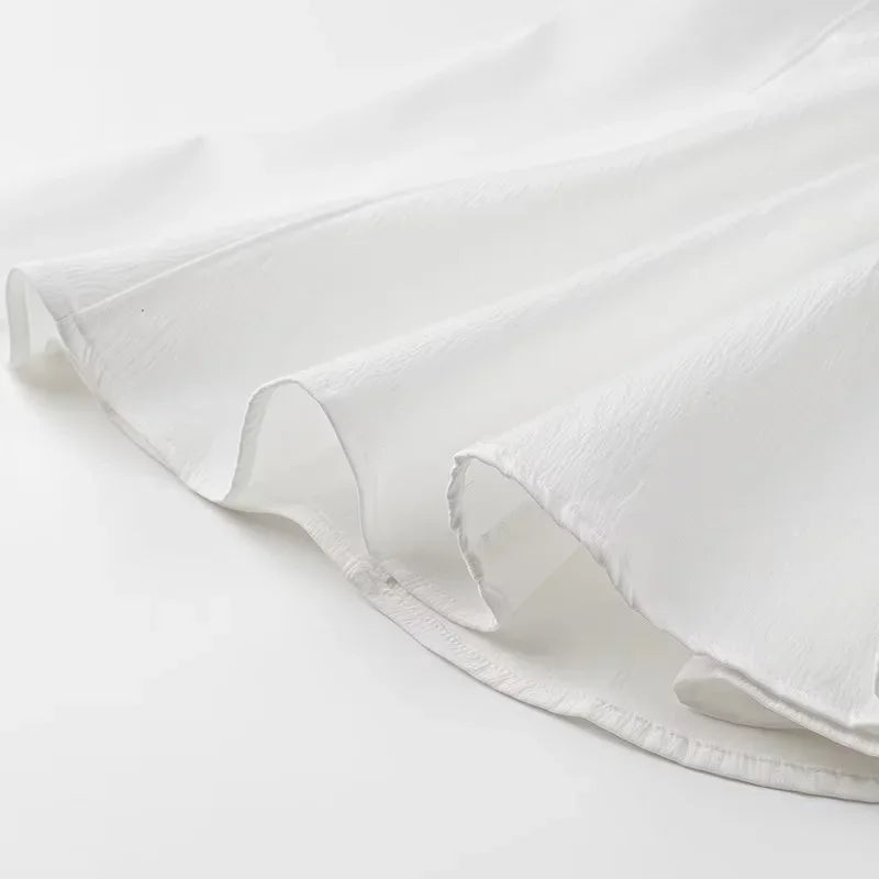 White Sleeveless Mini Dress With Back Zipper Folds Elegant