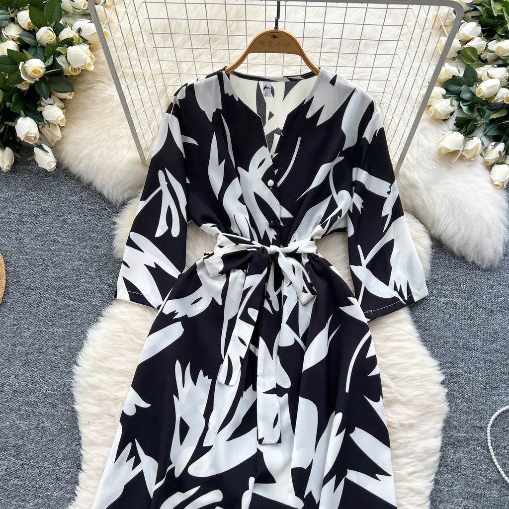 Women's Summer V-Neck Short Sleeve Lace-Up Waist Slim Fit Wide-Leg Printed Jumpsuit with Loose Straight Leg Design