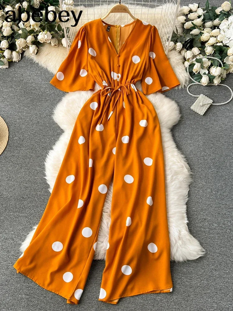 Women Wide Leg Polka Dot Jumpsuit with V Neck Dolman Sleeves and Slim Waist Design