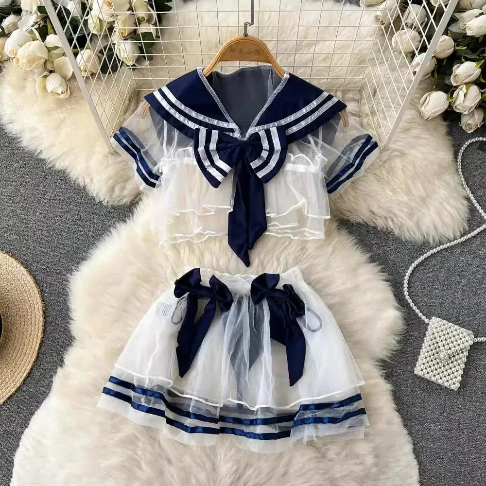 Women's Sexy Transparent Sailor Student Uniform Cosplay Costume Sheer Bowknot Stripe Patchwork Top with Mini Skirt Two-Piece Set