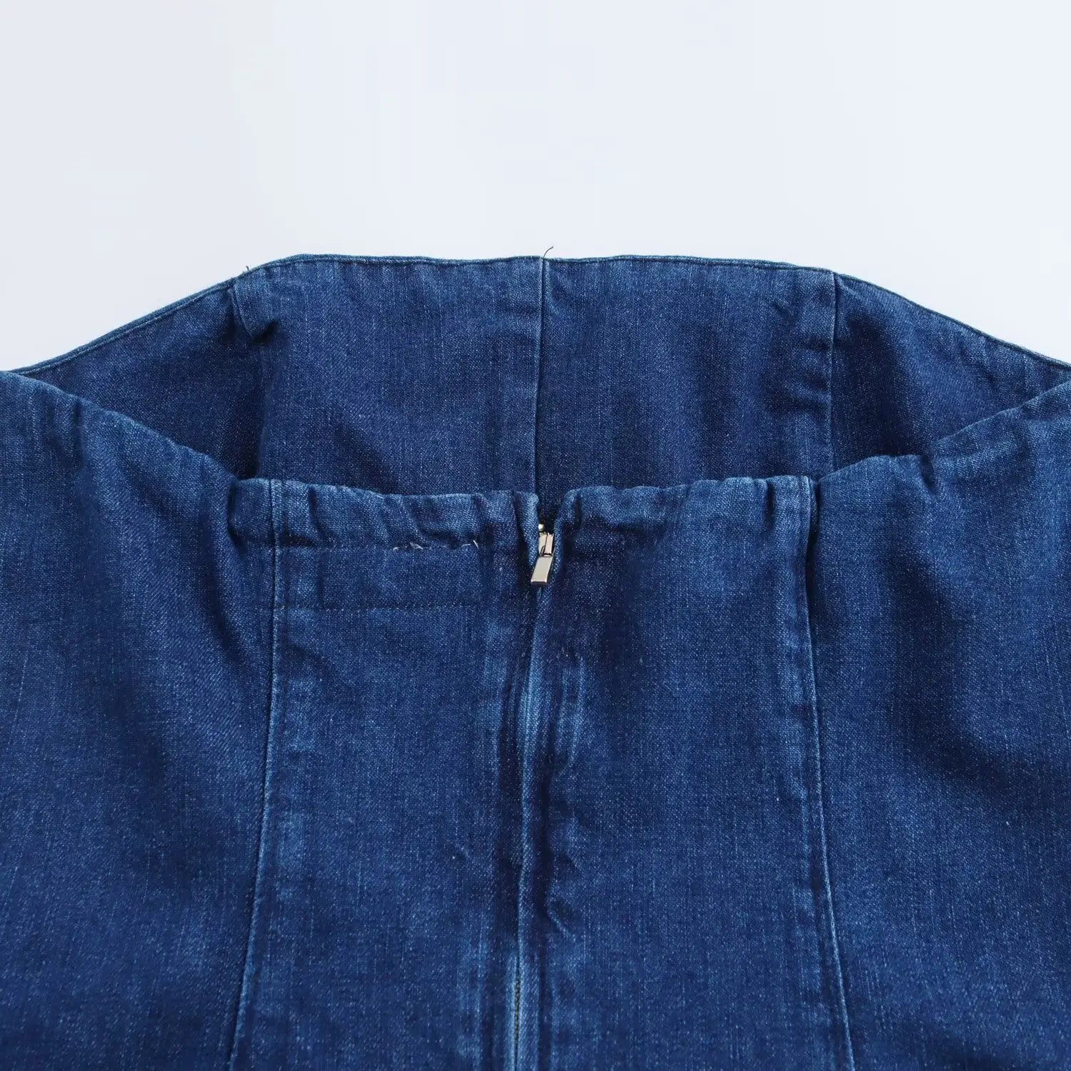 Strapless Denim Dress With Fitted Bodice And Pleated Skirt