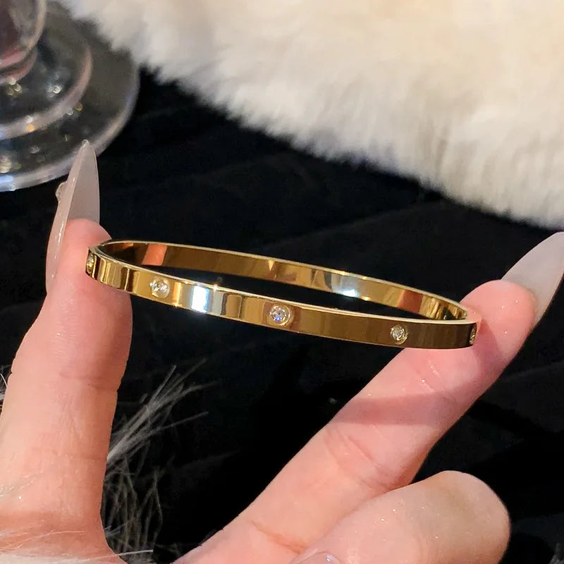 Titanium Steel Gold Bracelet for Women with Zircon Inlay, Fashionable Roman Design for Daily Wear