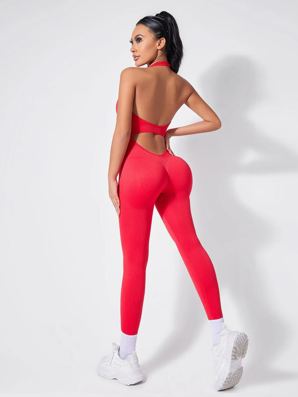 Ladies Vibrant Red Backless Hanging Neck Jumpsuit for Fitness and Fashionable Daily Wear