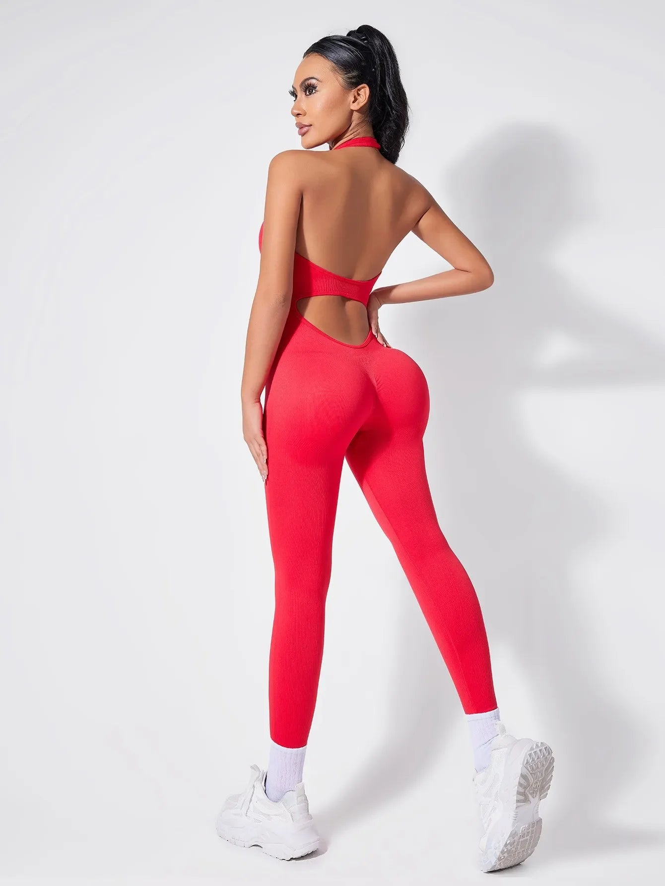 Ladies Vibrant Red Backless Hanging Neck Jumpsuit for Fitness and Fashionable Daily Wear