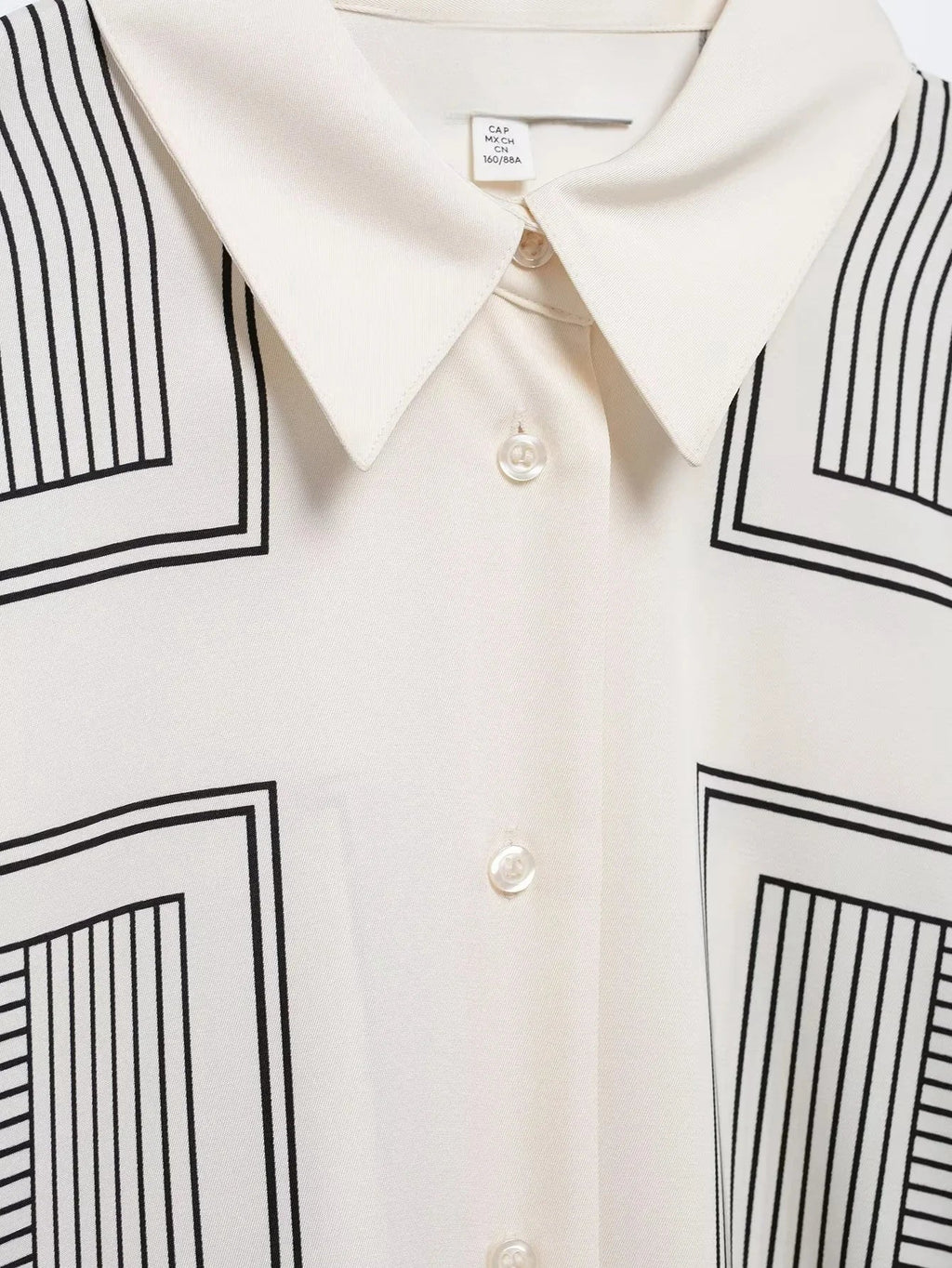 Stylish Women's Suit Set with Long Sleeve Shirt and Wide Leg Pants in Creamy Base and Geometric Patterns