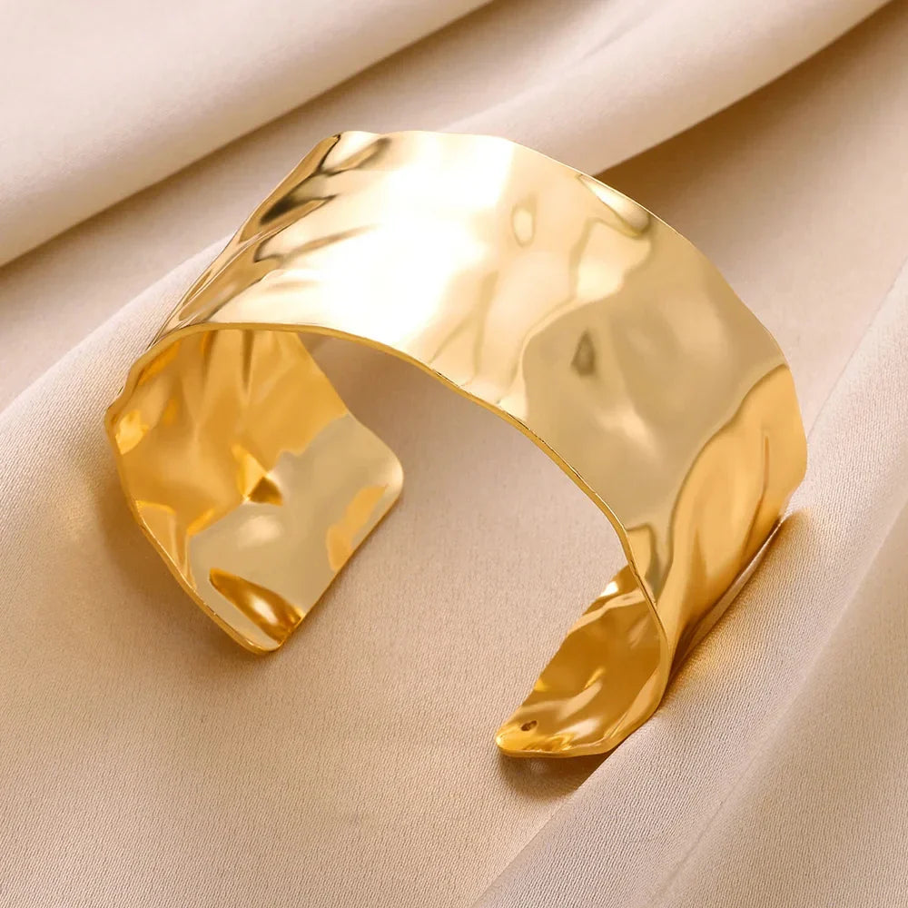 Elegant Gold Stainless Steel Bangle Bracelet with Classic Bump Pattern for Women
