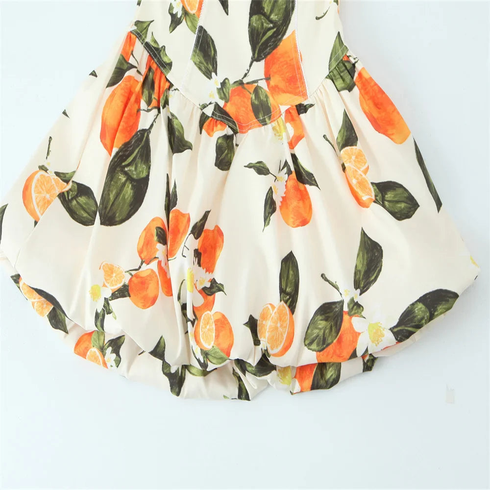 White Sleeveless Cross Back Dress With Orange Fruit Print