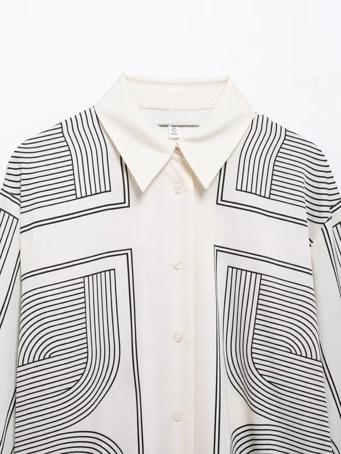 Stylish Women's Suit Set with Long Sleeve Shirt and Wide Leg Pants in Creamy Base and Geometric Patterns