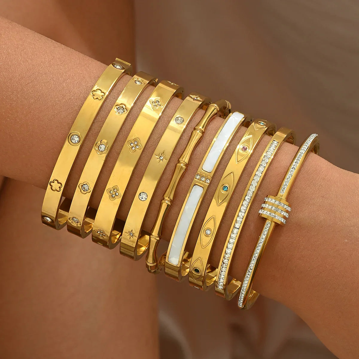 Stainless Steel Four-Leaf Clover Lucky Bracelet for Women Stylish Gold Nail Bangle