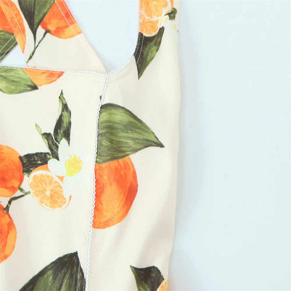White Sleeveless Cross Back Dress With Orange Fruit Print