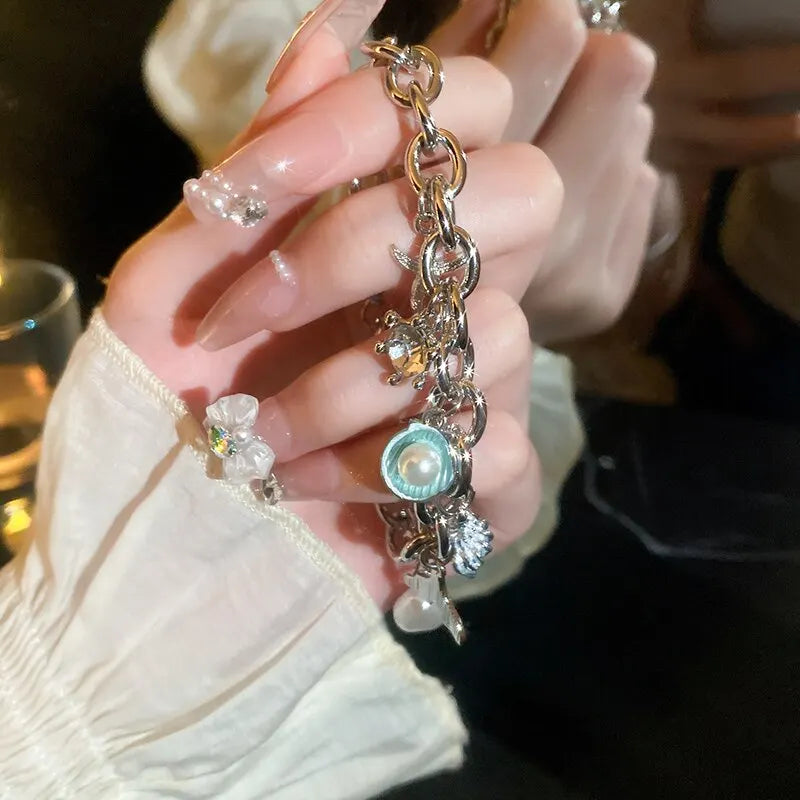 Starfish Shell Conch Bracelet with Imitation Pearl and Gold Color Chain for Women Ocean Inspired Summer Beach Jewelry