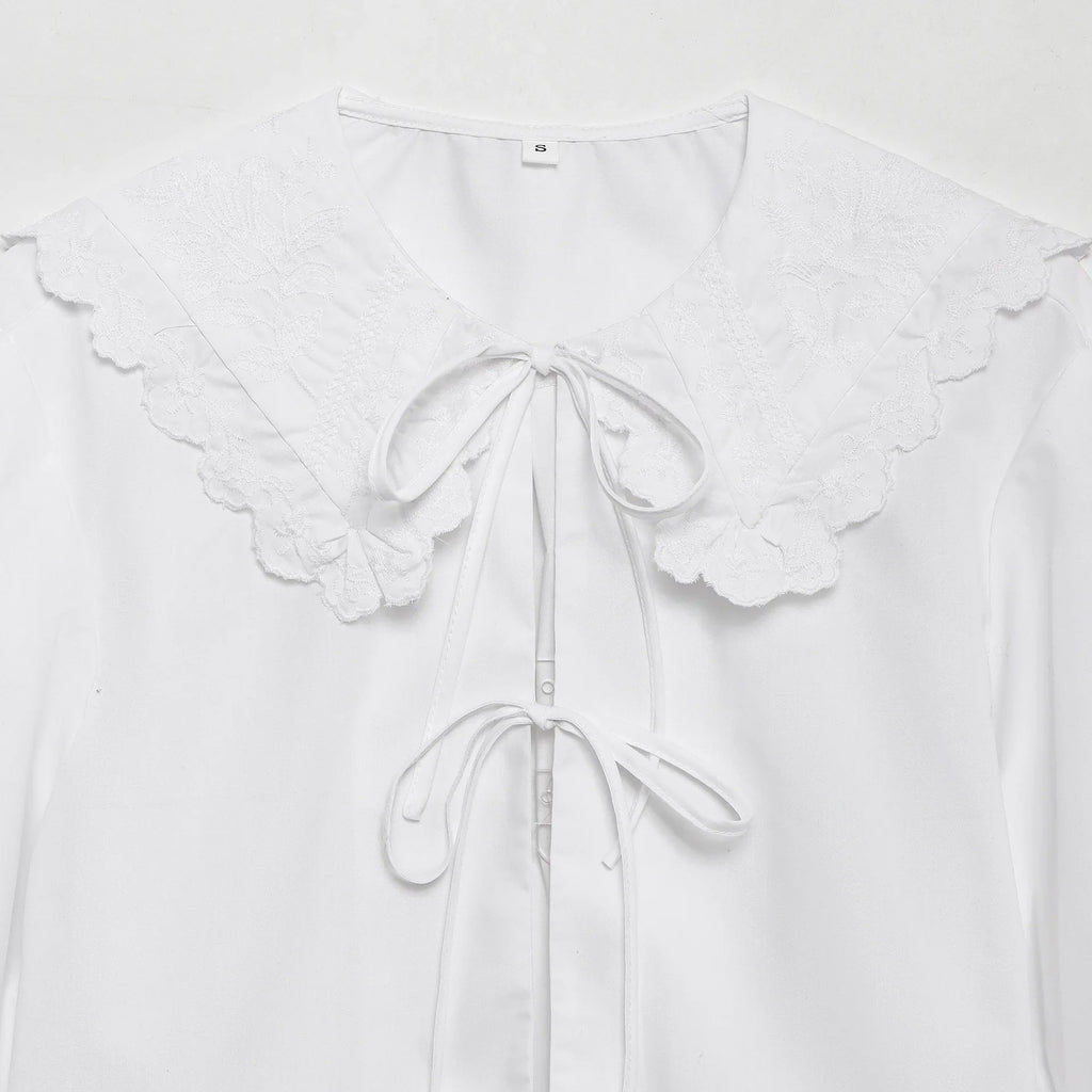 Women's Embroidered Lace-Up Poplin Shirt with Peter Pan Collar Puff Sleeves Loose Hem Casual Chic Top for Spring and Summer