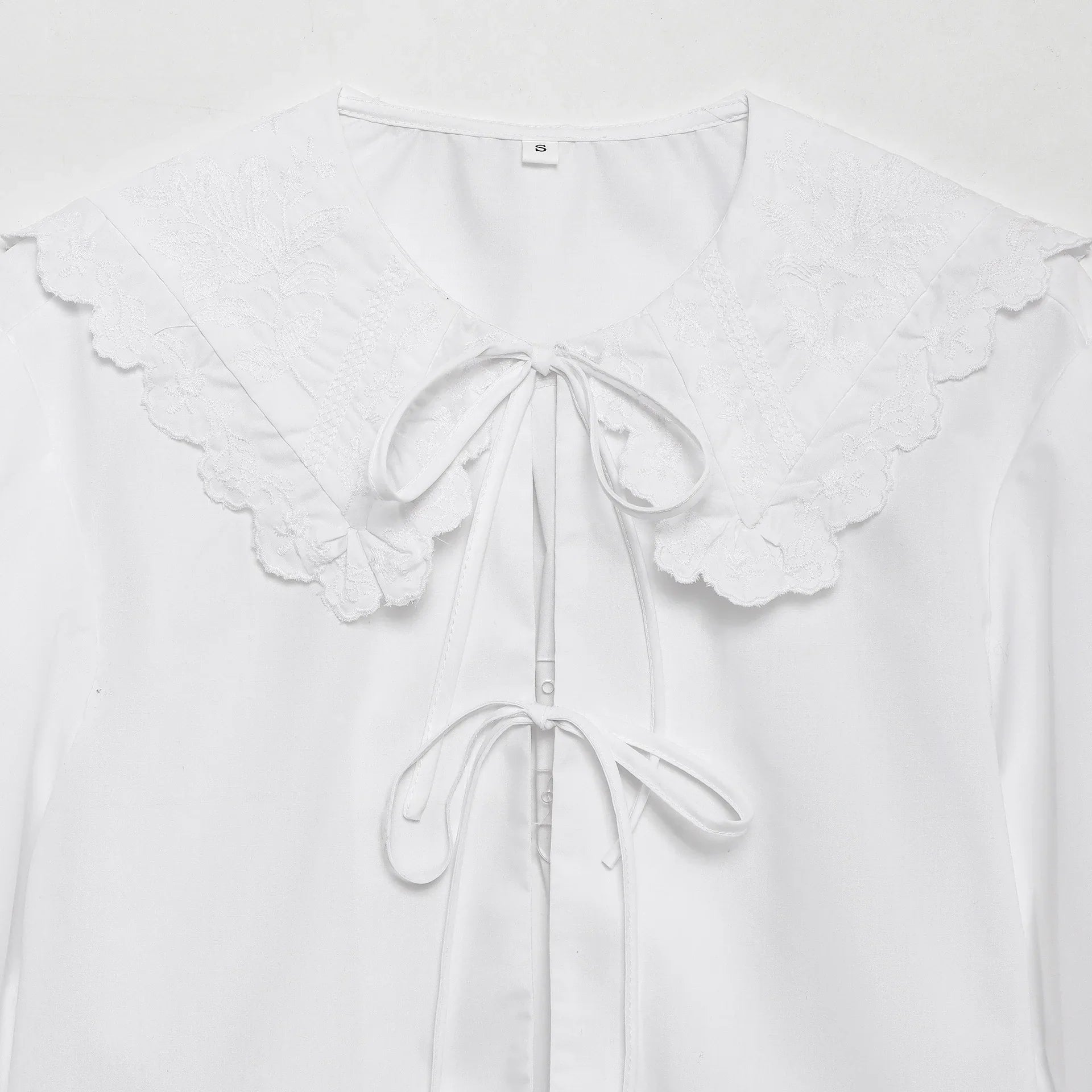 Women's Embroidered Lace-Up Poplin Shirt with Peter Pan Collar Puff Sleeves Loose Hem Casual Chic Top for Spring and Summer