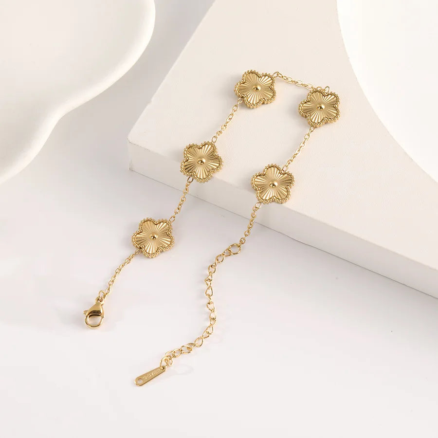 Minimalist 18K Gold Plated Flower Bracelet for Women with Plum Blossom Design and Cuban Chain for Daily Wear Jewelry Gift