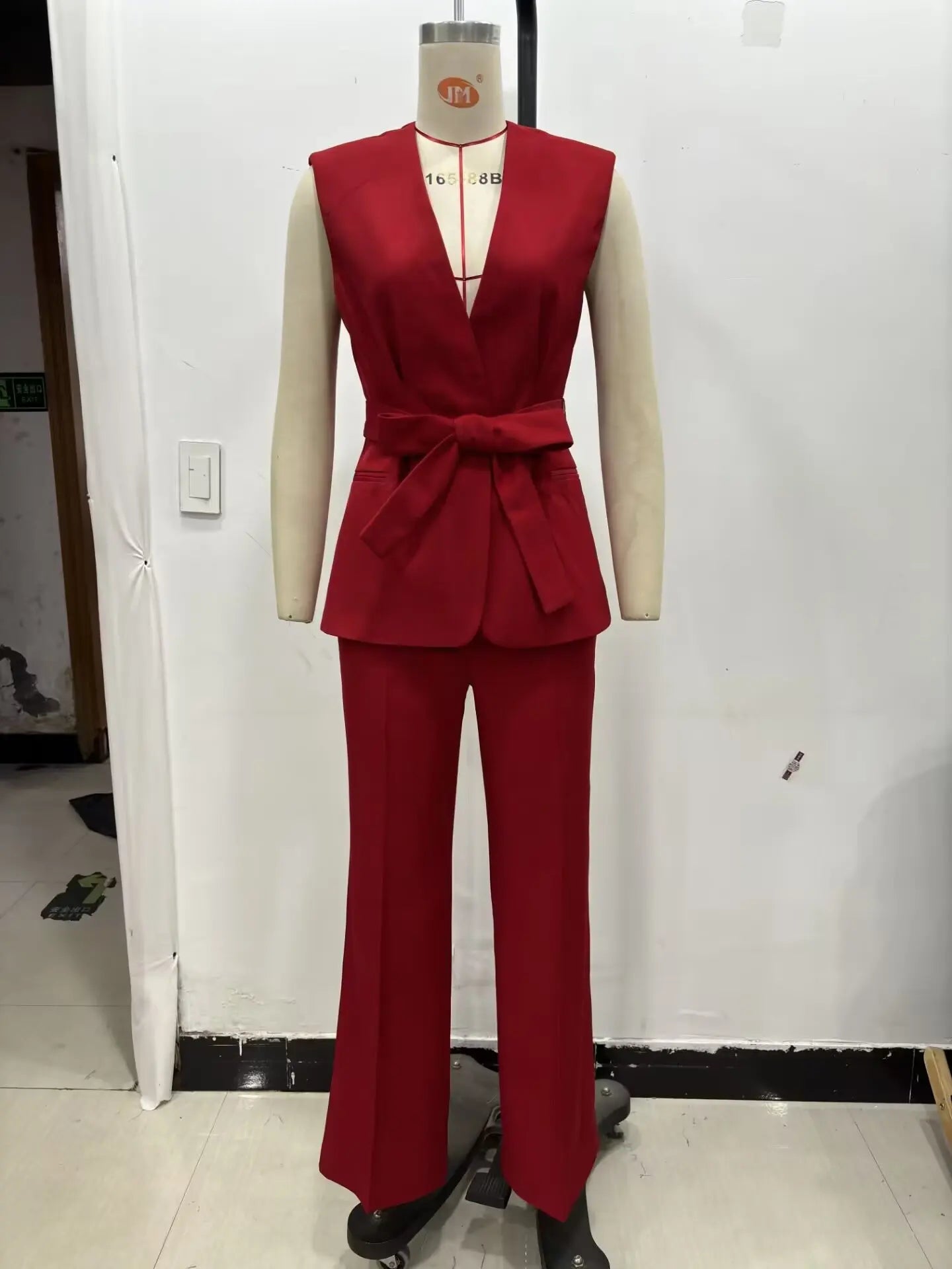 Elegant Red Belted Vest and Flared Pants Suit for Women Stylish and Versatile Two-Piece Outfit with Simple Chic Design