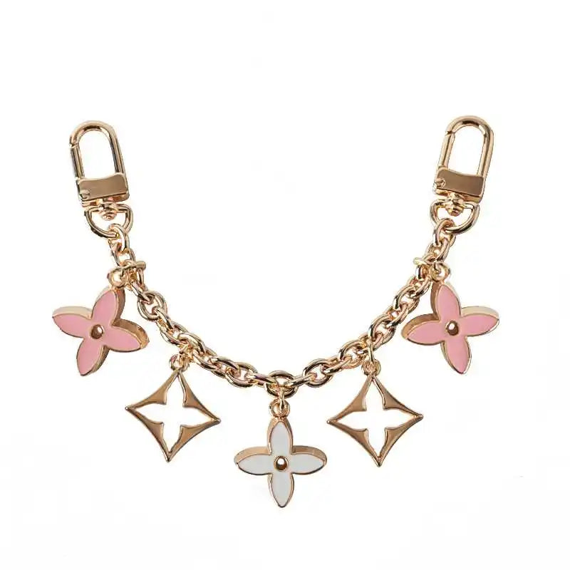 Trendy Black and White Four Leaf Flower Pendant Chain for Phone Decoration and Jewelry Bag Accessory