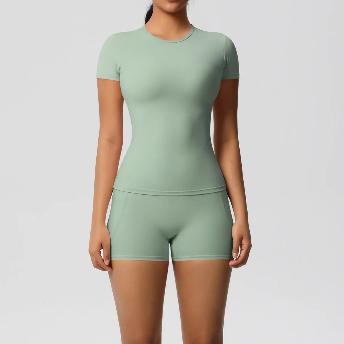 2PCS Women's Yoga Set with Pocketed Shorts and Short Sleeve Crop Top Sports Bra Comfortable Fitness Tracksuit Activewear for Gym and Outdoor Workouts