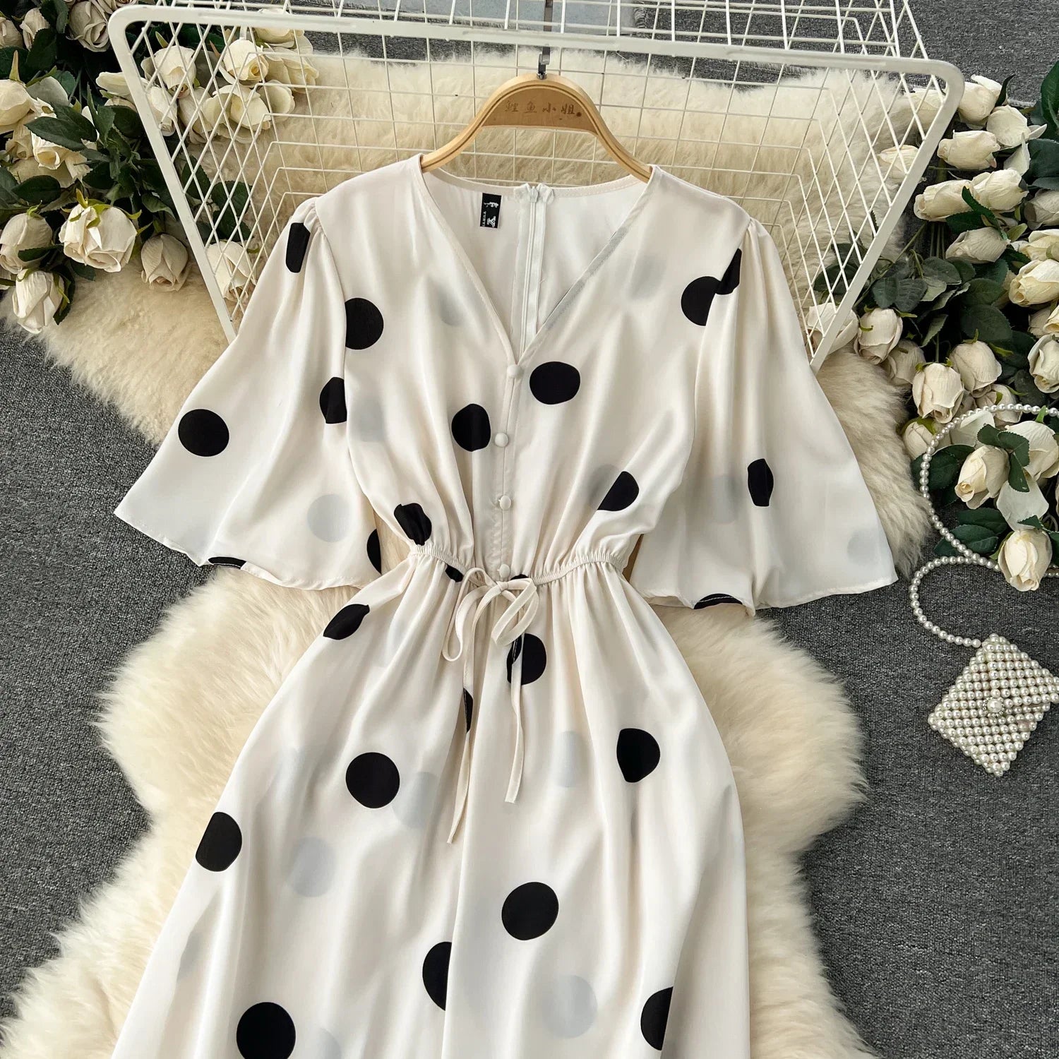 Women Wide Leg Polka Dot Jumpsuit with V Neck Dolman Sleeves and Slim Waist Design