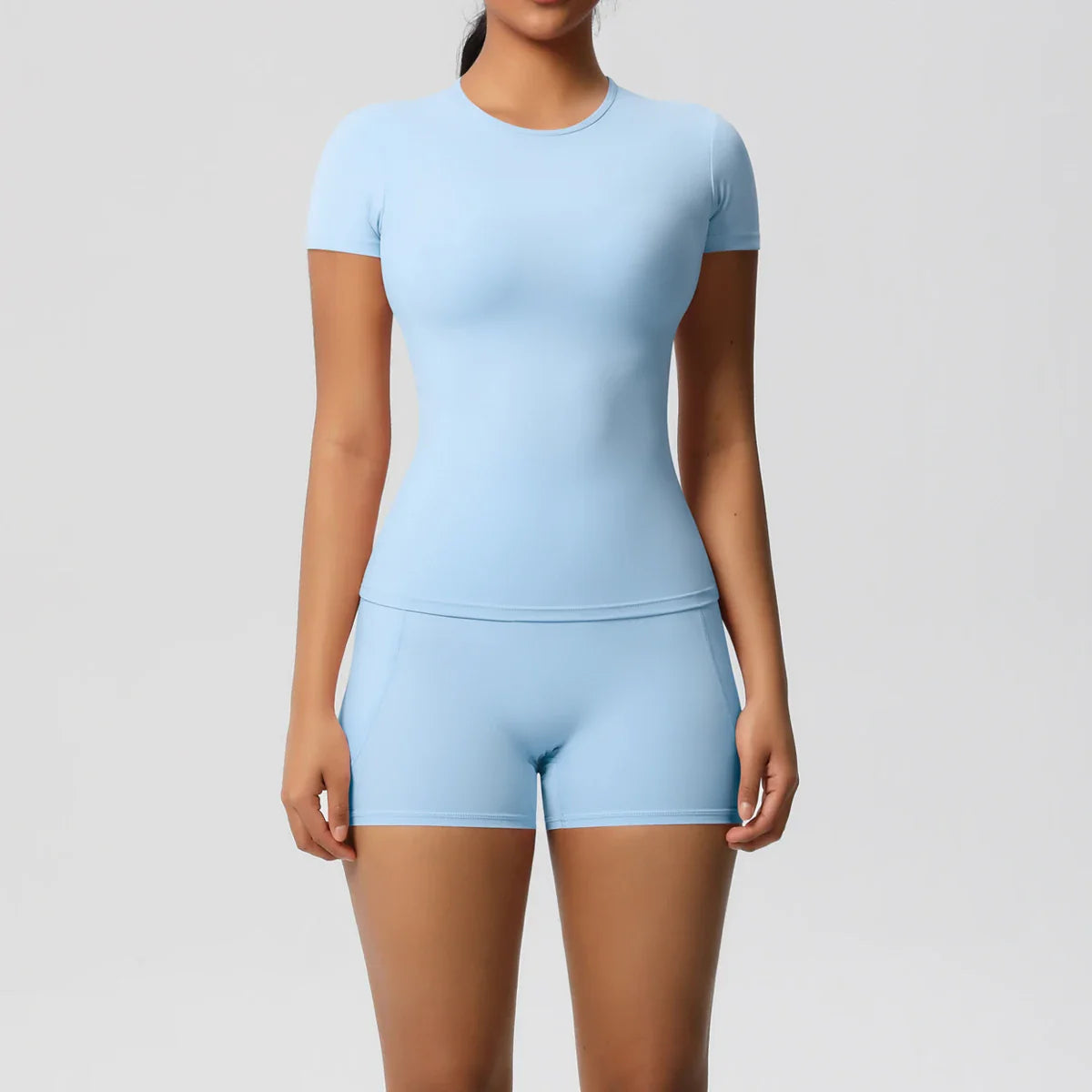 2PCS Women's Yoga Set with Pocketed Shorts and Short Sleeve Crop Top Sports Bra Comfortable Fitness Tracksuit Activewear for Gym and Outdoor Workouts