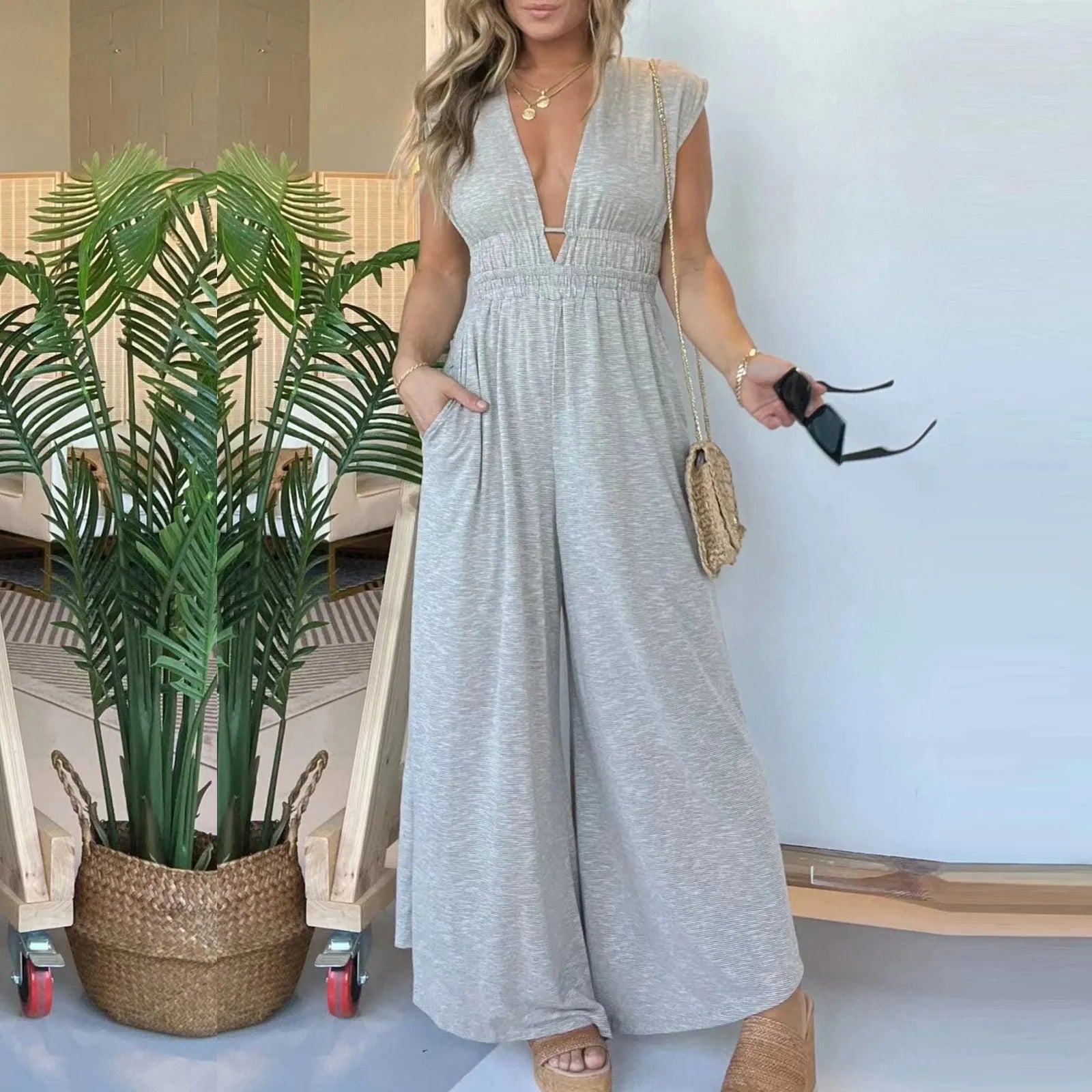 Elegant Summer Women's Slim Fit Sleeveless Romper V Neck Casual Loose Jumpsuit with Pockets Perfect for Vacation and Daily Wear
