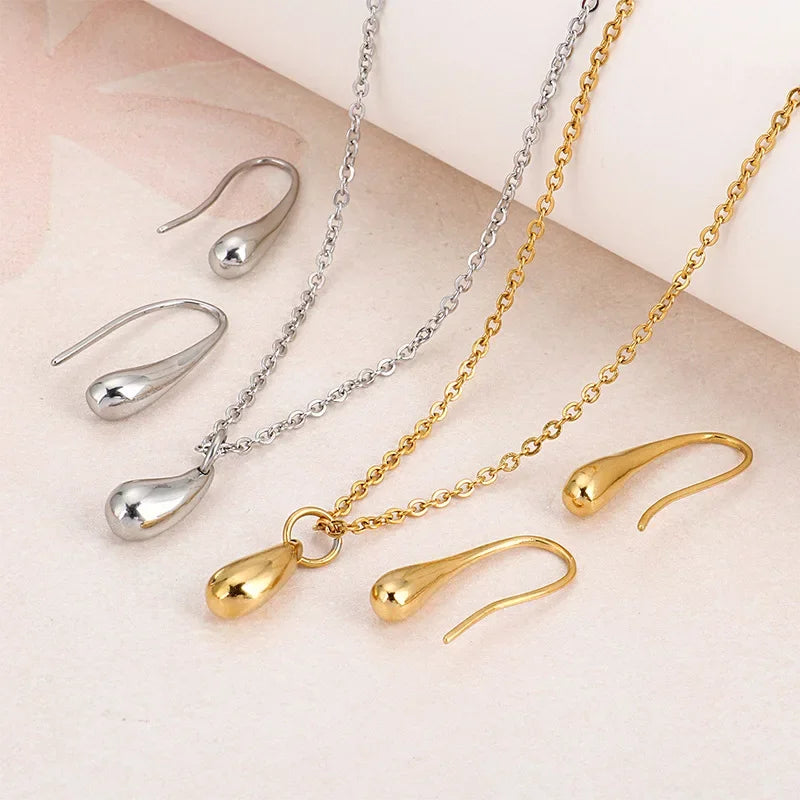 4PC Fashion Jewelry Set with Simple Rings Teardrop Necklace Bracelet and Earrings for Women