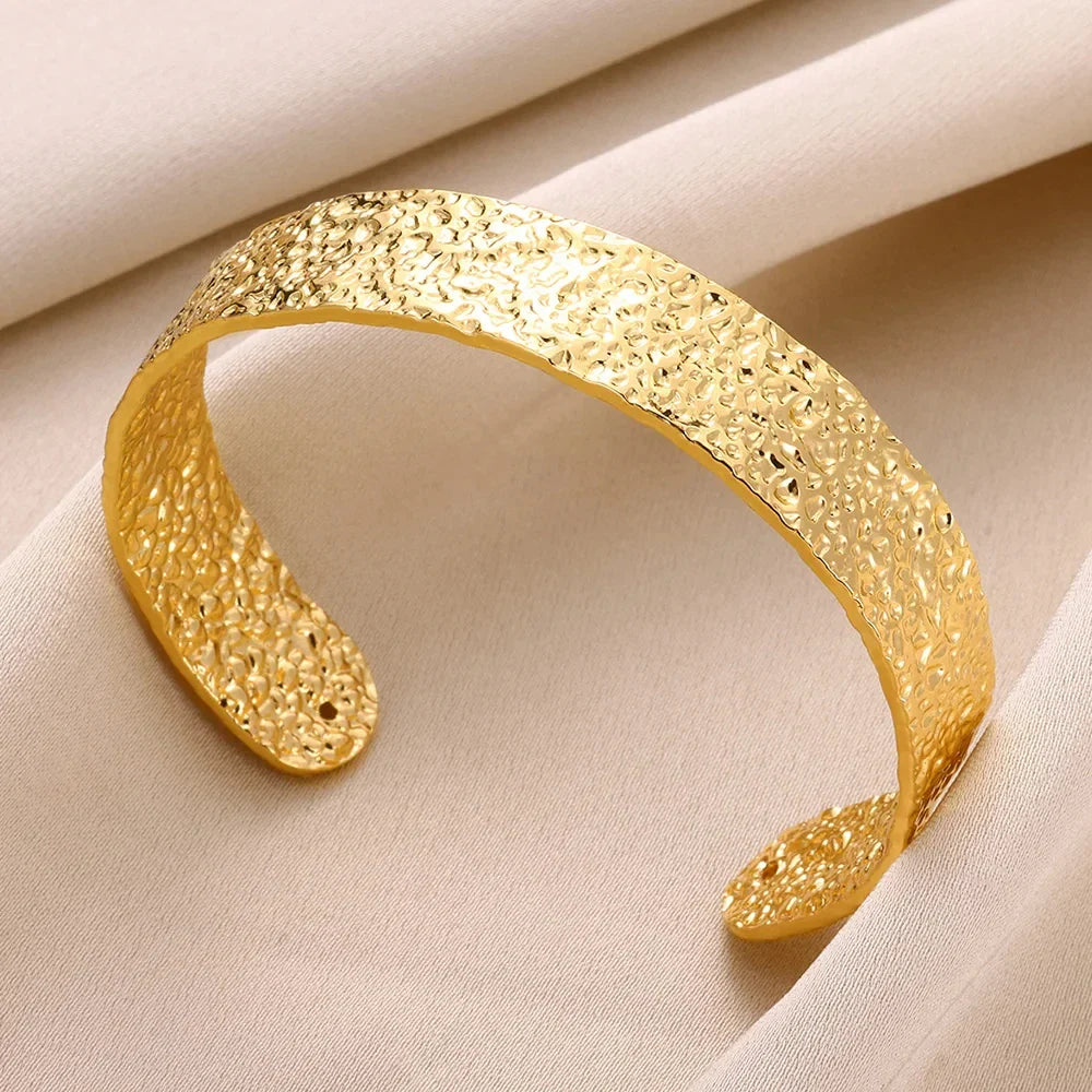 Elegant Gold Stainless Steel Bangle Bracelet with Classic Bump Pattern for Women