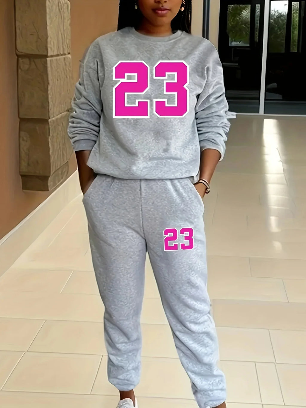 Casual Two-Piece Kangaroo Pocket Sweatshirt Set for Women with Round Neck and Solid Long Sleeves