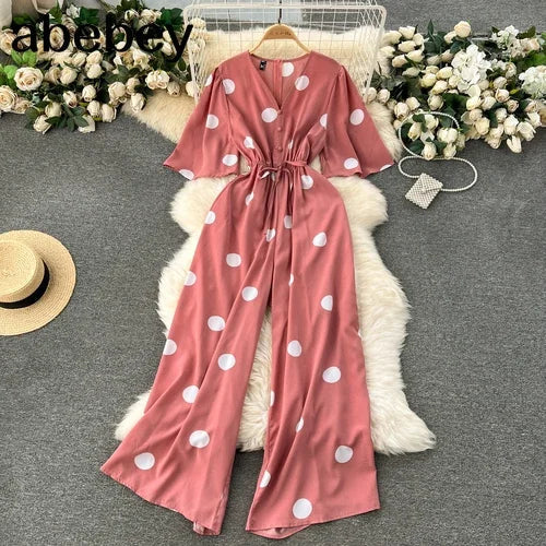 Women Wide Leg Polka Dot Jumpsuit with V Neck Dolman Sleeves and Slim Waist Design