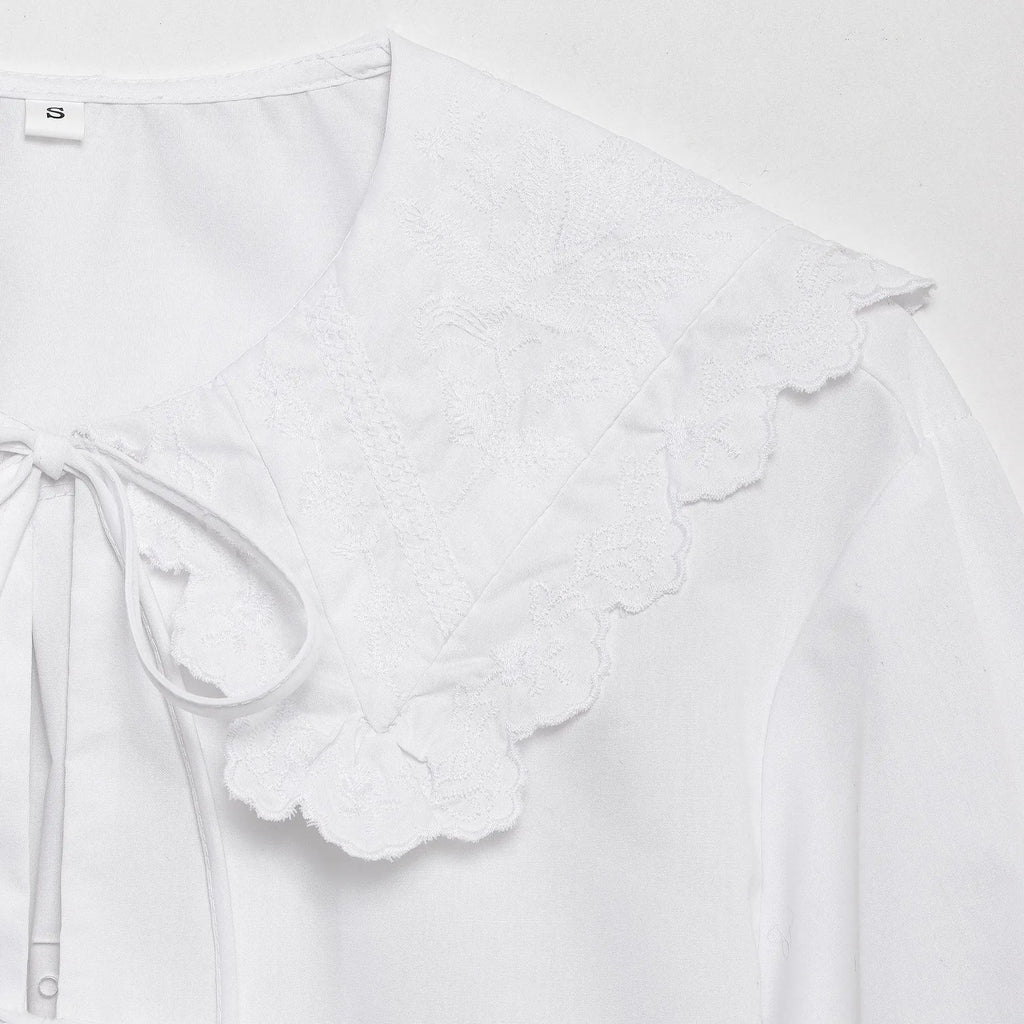 Women's Embroidered Lace-Up Poplin Shirt with Peter Pan Collar Puff Sleeves Loose Hem Casual Chic Top for Spring and Summer