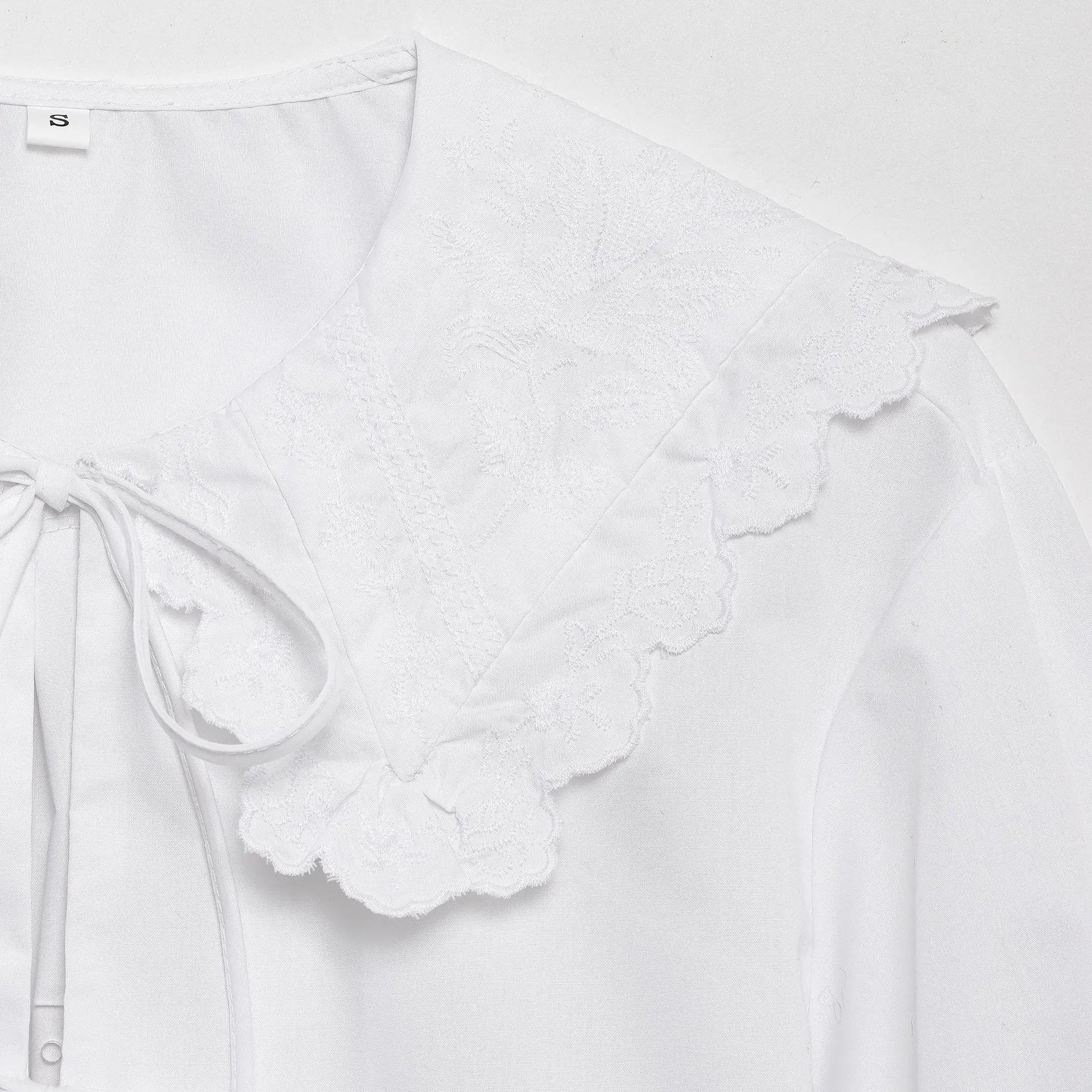Women's Embroidered Lace-Up Poplin Shirt with Peter Pan Collar Puff Sleeves Loose Hem Casual Chic Top for Spring and Summer