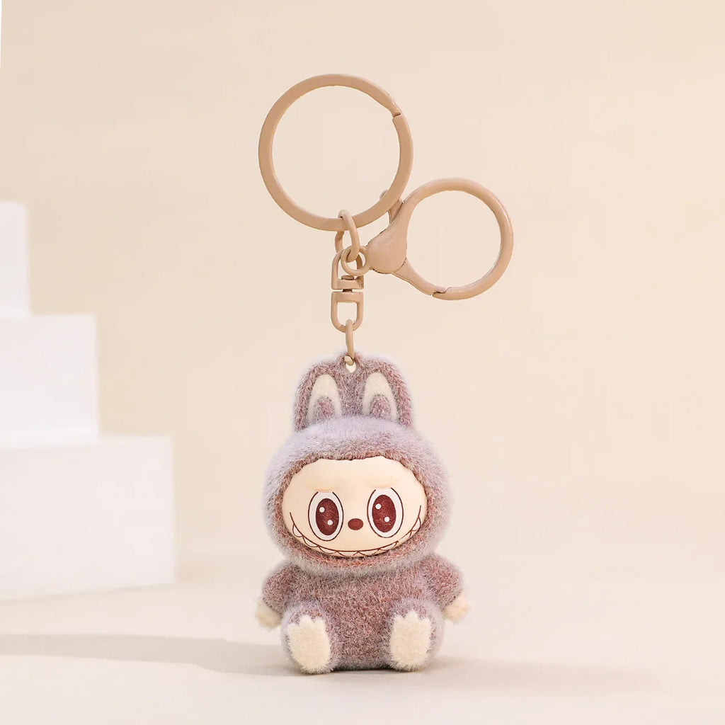 Sitting Labubu Doll Keychain Cute Fluff PVC Toy Phone Ornaments Bag Charms for Car and Christmas Gifts