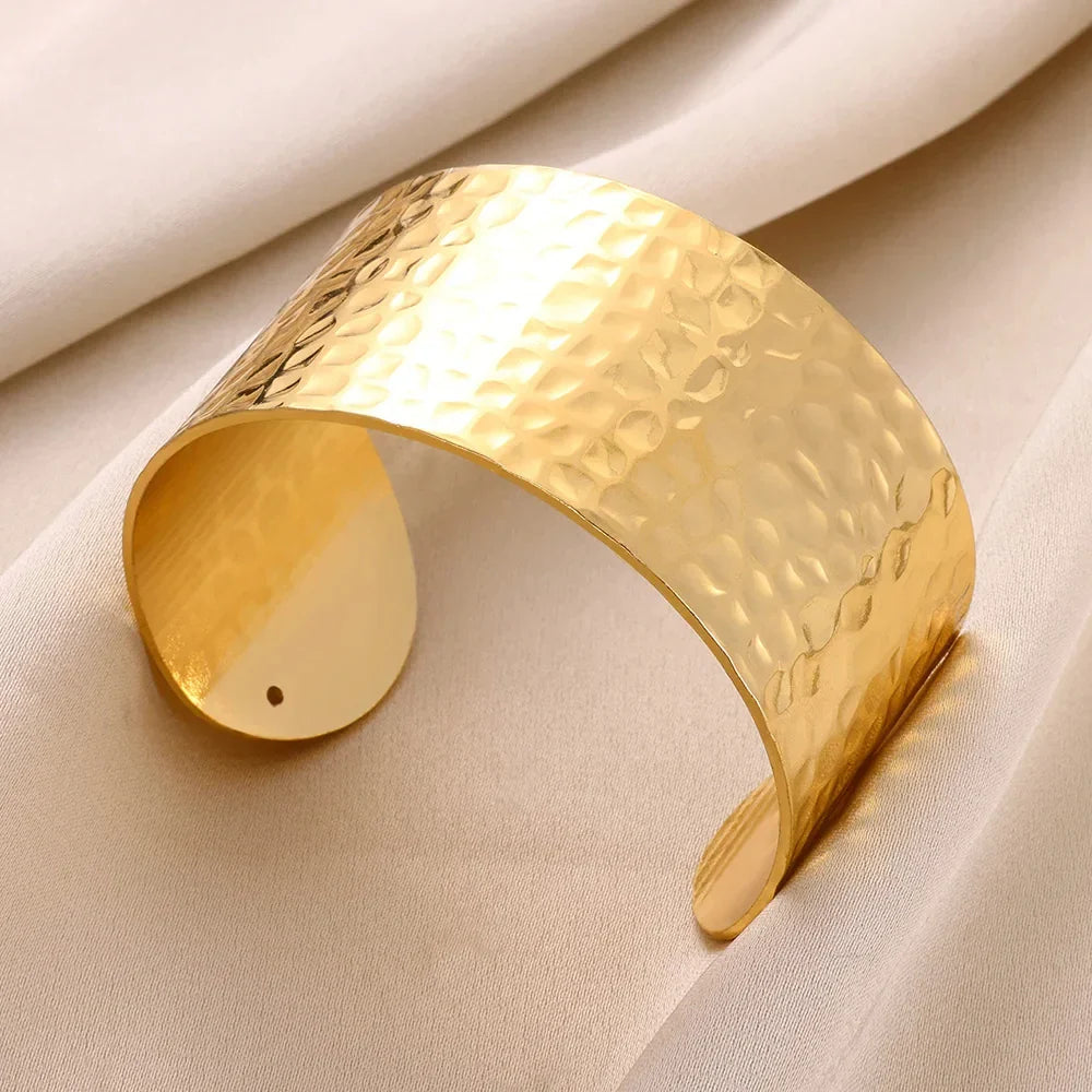 Elegant Gold Stainless Steel Bangle Bracelet with Classic Bump Pattern for Women
