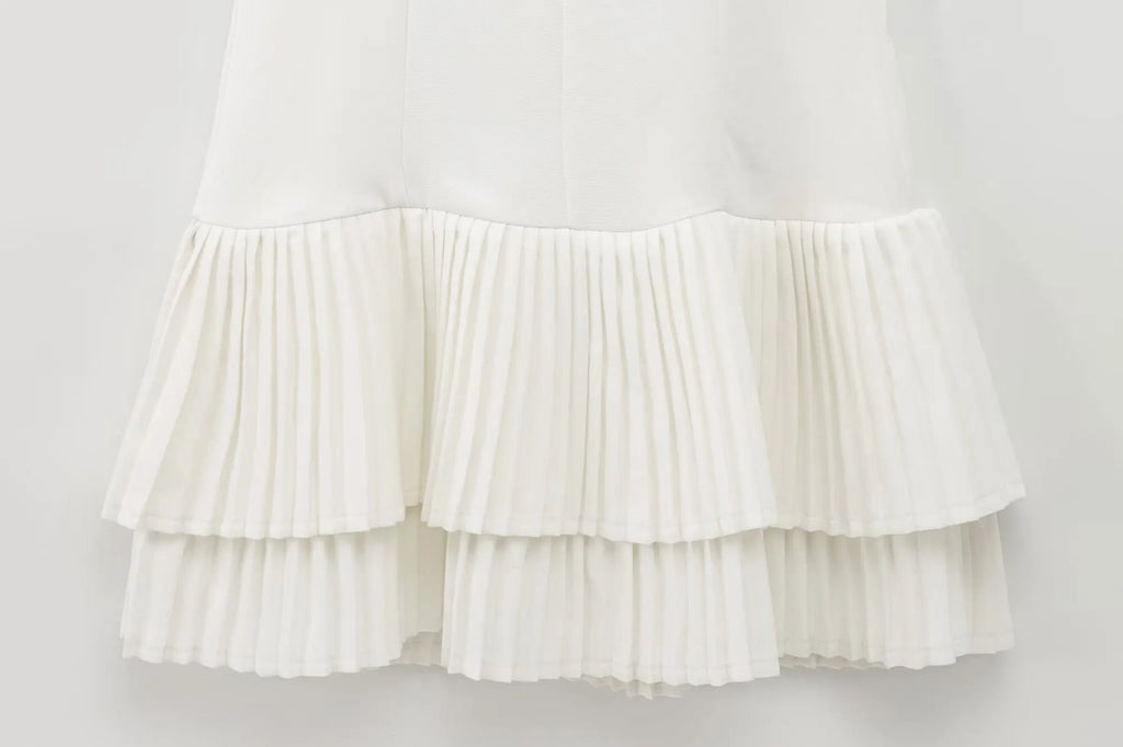 Elegant Womens Sleeveless Solid Mini Dress With Pleated Hem