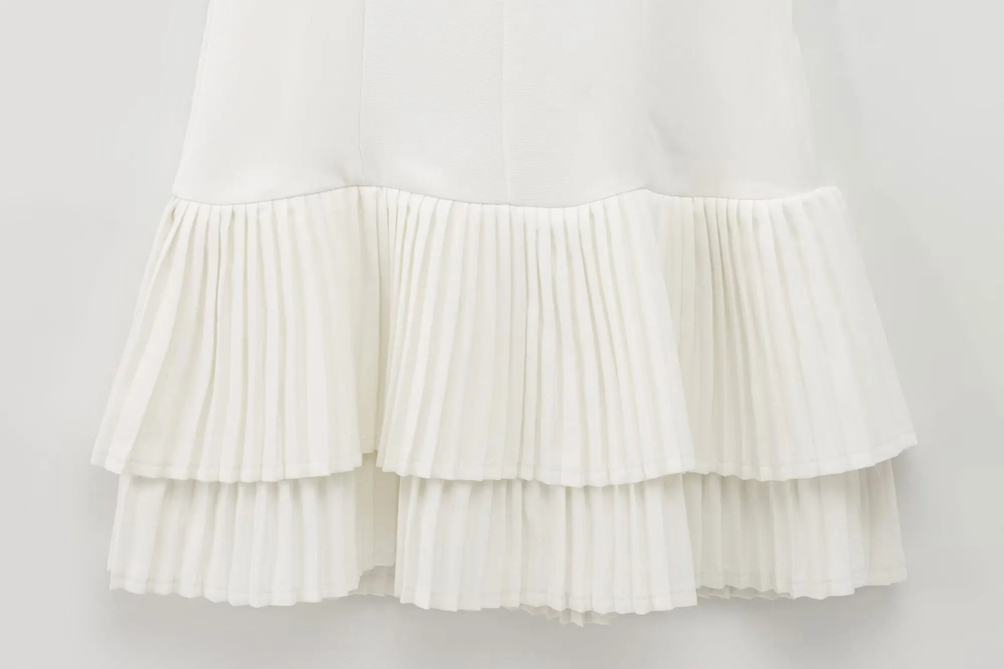 Elegant Womens Sleeveless Solid Mini Dress With Pleated Hem