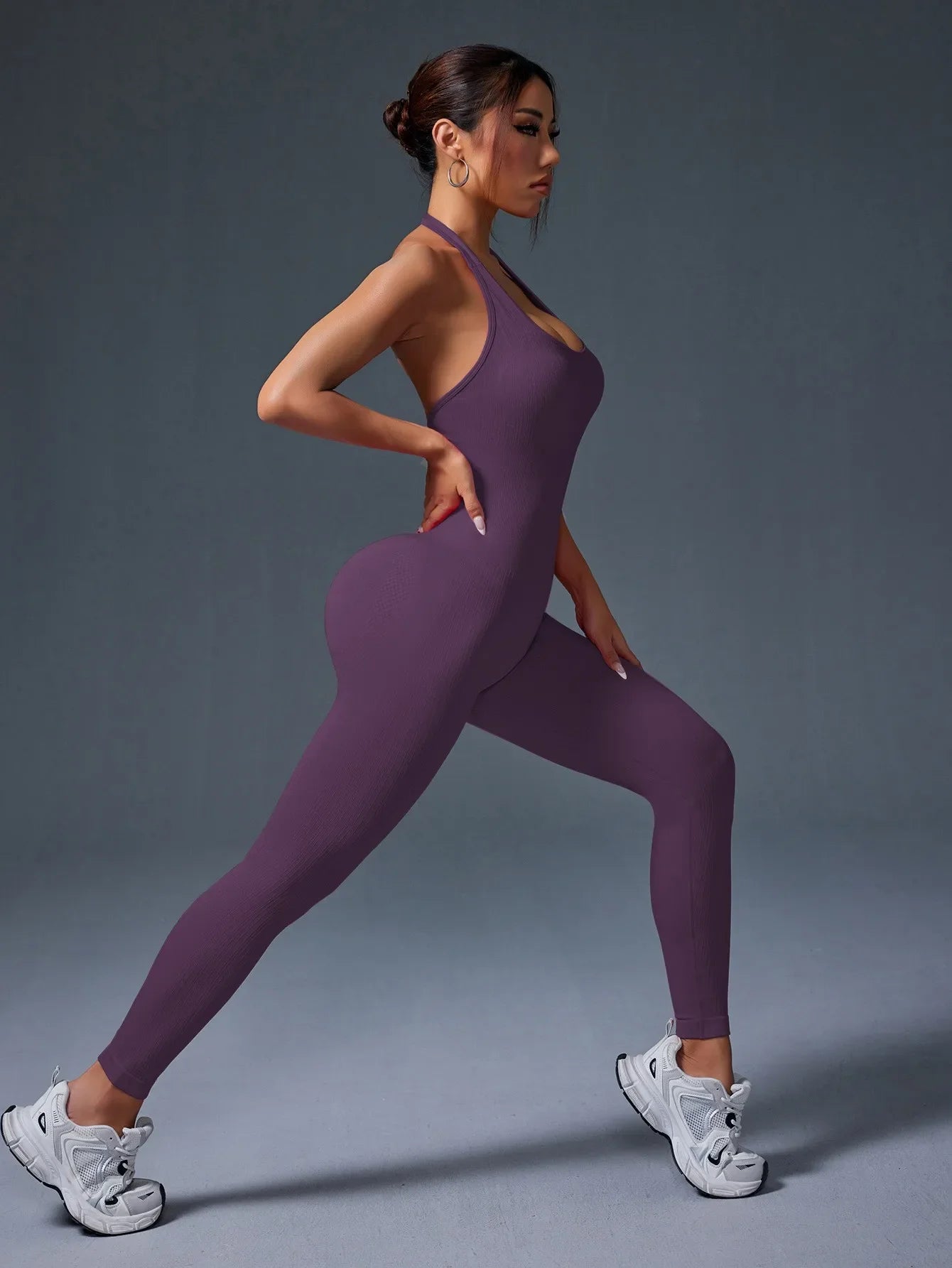Women's Purple Ribbed Backless Hanging Neck Yoga Jumpsuit Tailored Fit for Body Contouring and Comfort