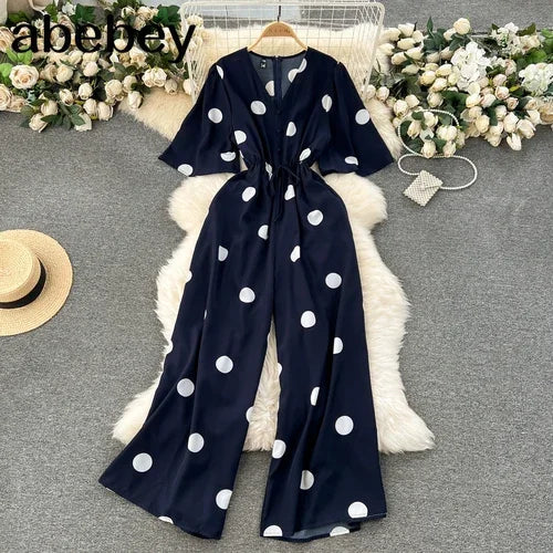 Women Wide Leg Polka Dot Jumpsuit with V Neck Dolman Sleeves and Slim Waist Design