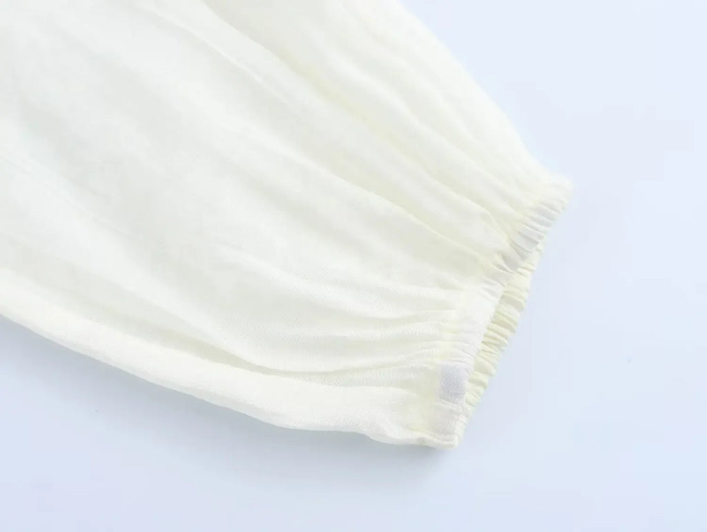 Women's Fashion V-Neck Puffy Long Sleeve Shirt with Layered Decoration and Elegant Temperament