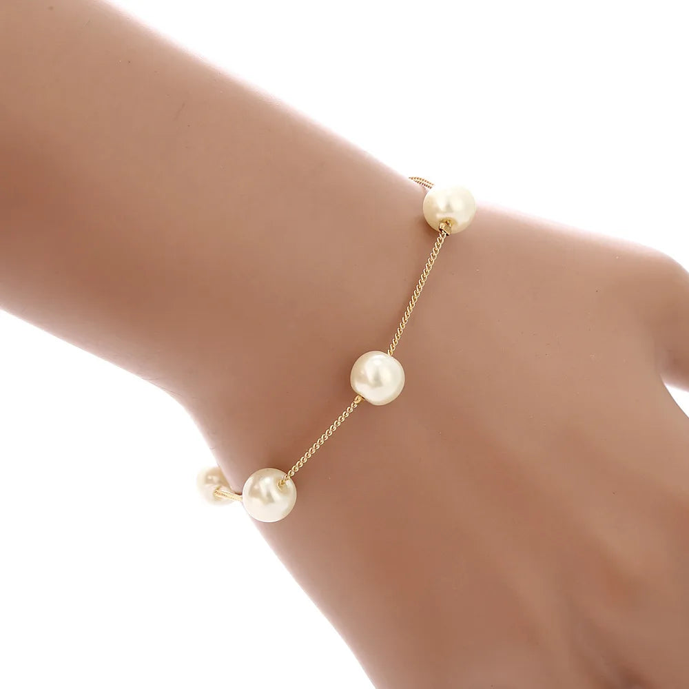 Gold-Plated Imitation Pearl Necklace Earring Bracelet Set for Ladies with Elegant Tassel Design