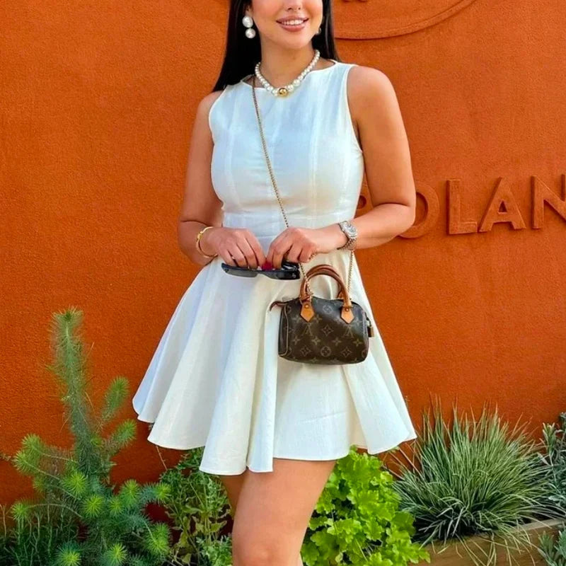 White Sleeveless Mini Dress With Back Zipper Folds Elegant