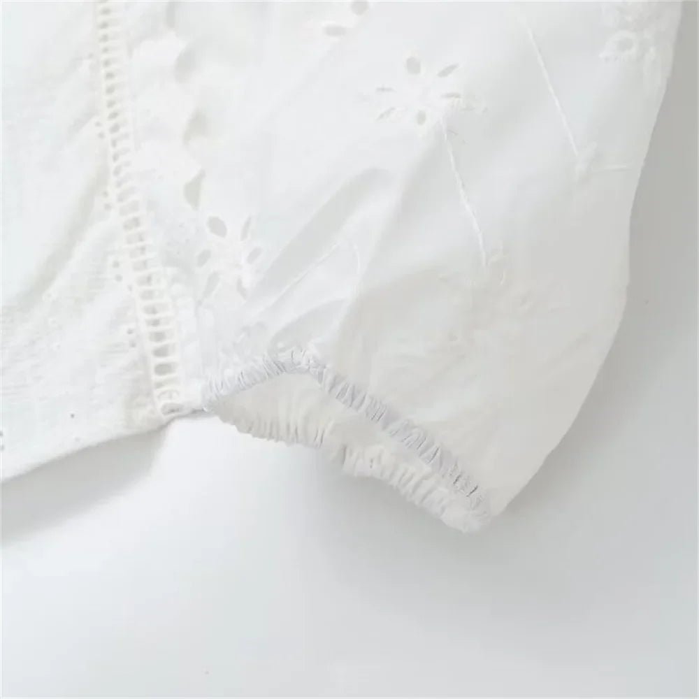 Women's Single Breasted Round Neck Lantern Sleeve Embroidered Hollow Shirt with Elegant Design and Slimming Fit