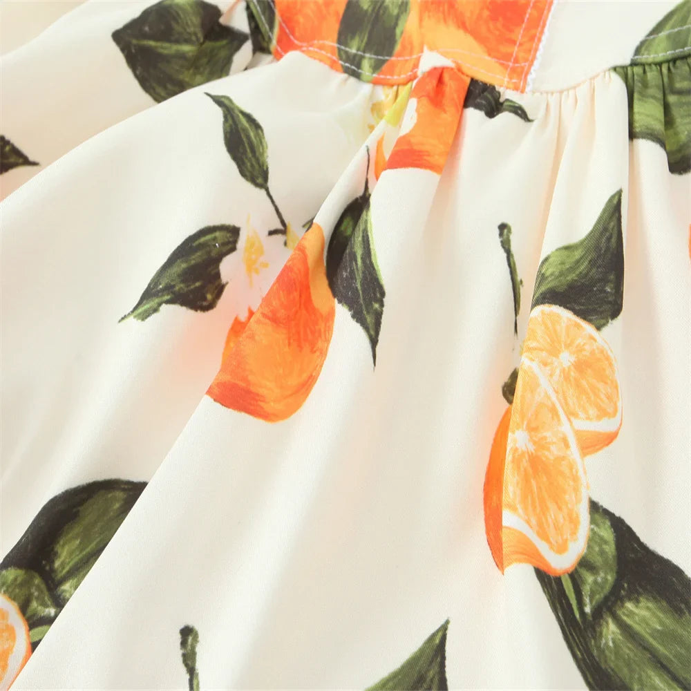 White Sleeveless Cross Back Dress With Orange Fruit Print