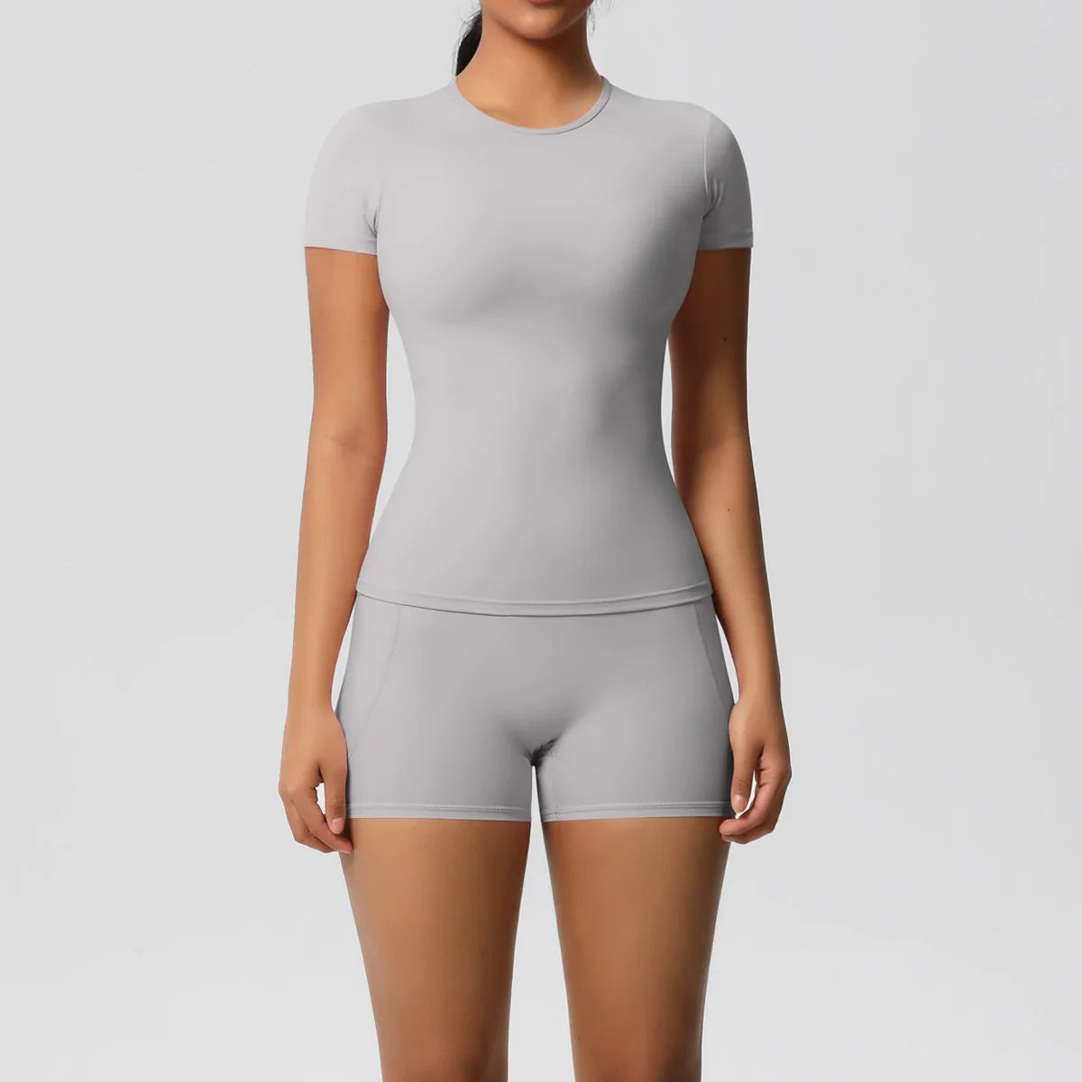 2PCS Women's Yoga Set with Pocketed Shorts and Short Sleeve Crop Top Sports Bra Comfortable Fitness Tracksuit Activewear for Gym and Outdoor Workouts