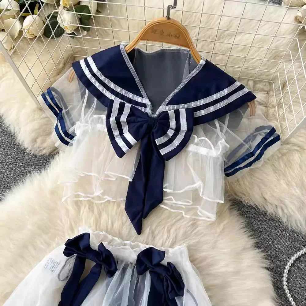 Women's Sexy Transparent Sailor Student Uniform Cosplay Costume Sheer Bowknot Stripe Patchwork Top with Mini Skirt Two-Piece Set