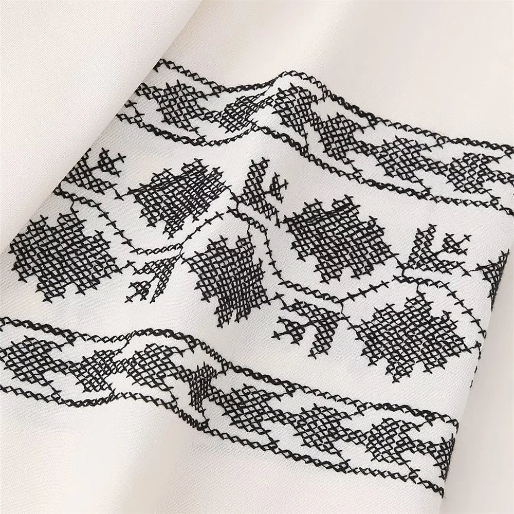 Loose Fit White Embroidered Cover Up Shirt Top for Women with Stylish Contrast Detailing and Versatile Casual Design