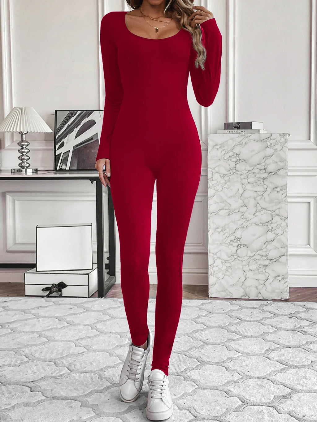 Sexy Chest-Revealing Waist-Cinching Boat Collar Jumpsuit with Long Sleeves and Small Hole Strip Design
