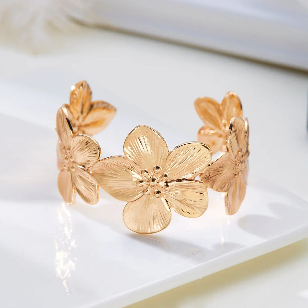 Gold Plated Adjustable Cuff Bracelet with Hollow Flower Butterfly Design in High Quality Stainless Steel for Women Jewelry
