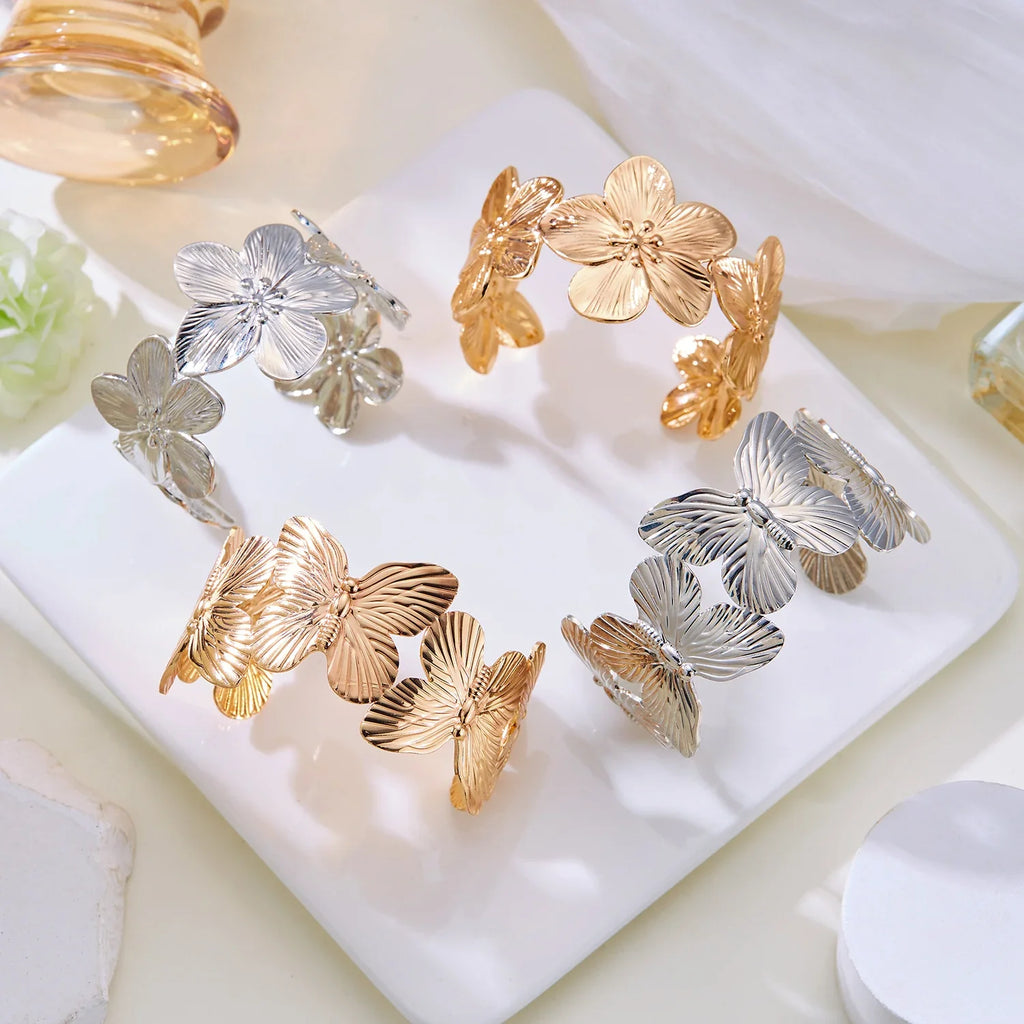 Gold Plated Adjustable Cuff Bracelet with Hollow Flower Butterfly Design in High Quality Stainless Steel for Women Jewelry