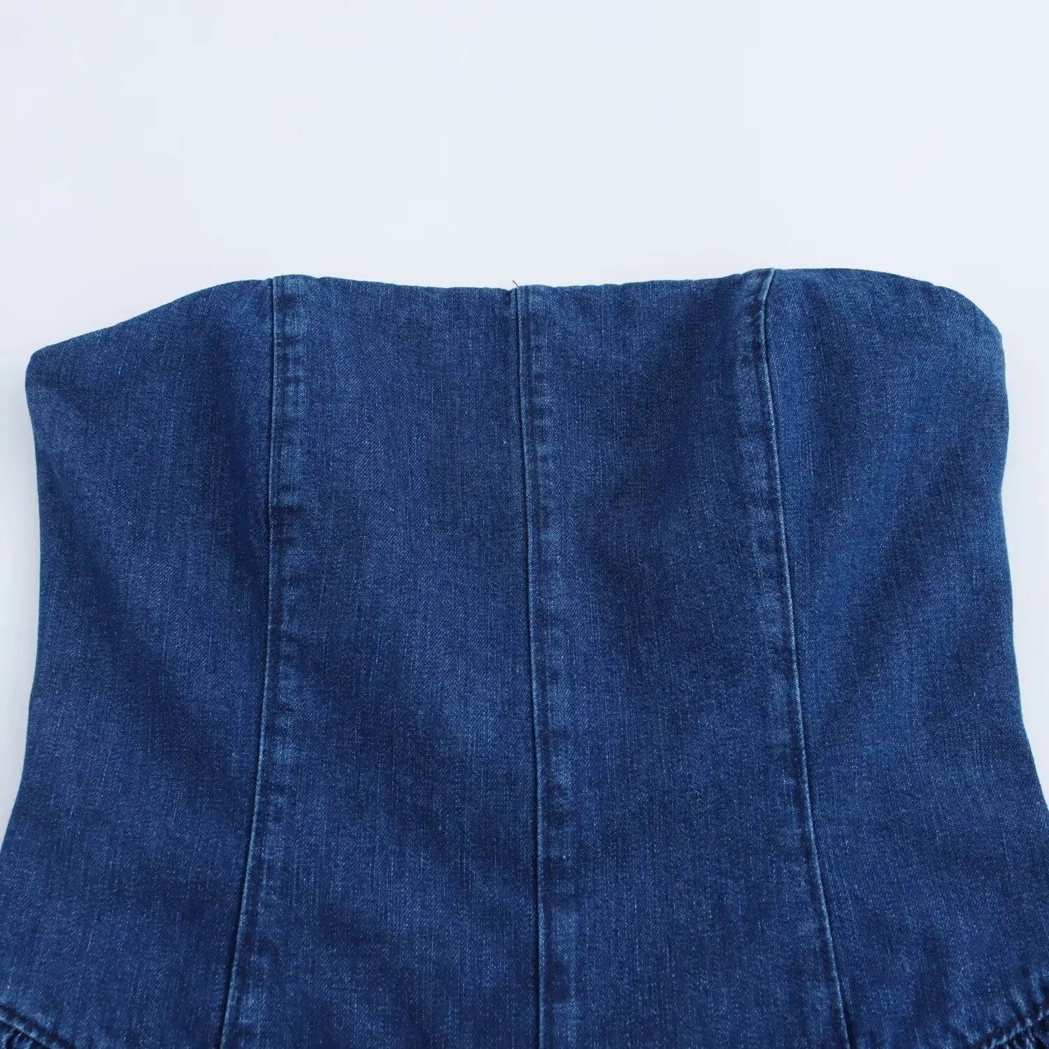 Strapless Denim Dress With Fitted Bodice And Pleated Skirt